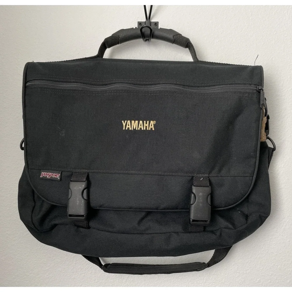 JanSport Mens Black Messenger Bag Yamaha Embroidered Suede Trim Laptop Bag